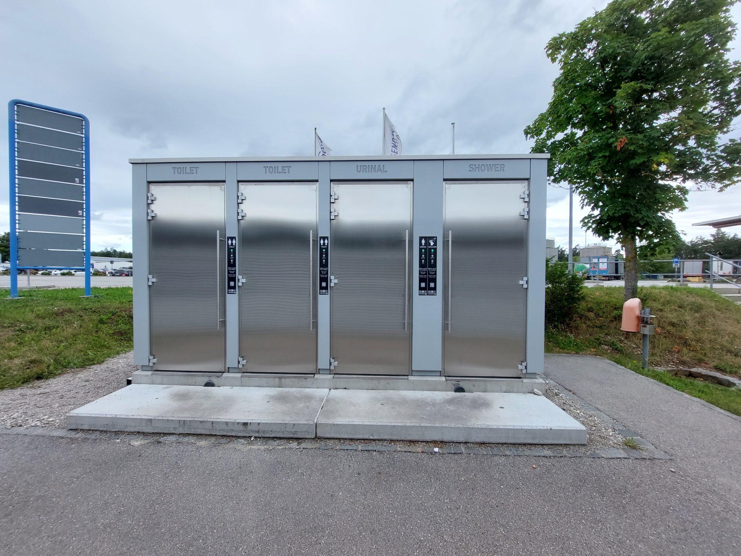 2 non-self-cleaning toilets, a urinal, and a shower room accessible from the outside.